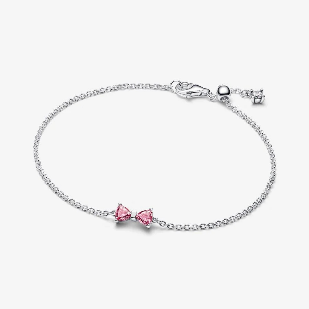 Bow sterling silver bracelet with fancy pink and clear cubic zirconia