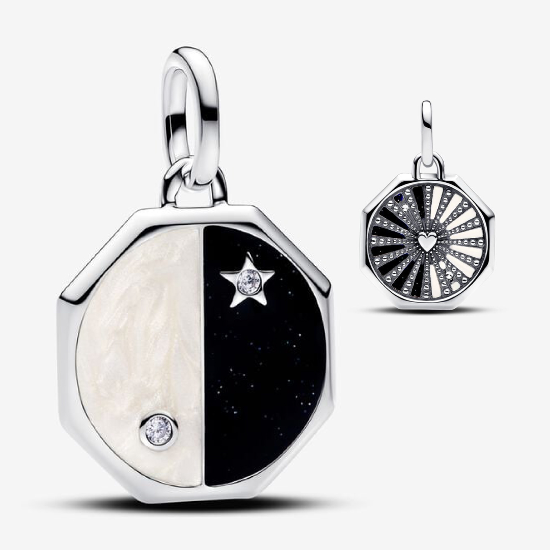 Opposite attraction sterling silver medallion with clear cubic zirconia, glittery black and white enamel